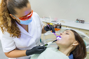 young man lying down with nitrous oxide mask over his nose